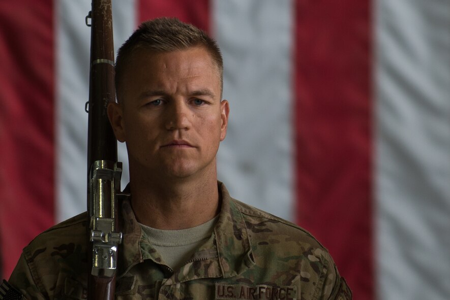 A U.S. Airman with the Bagram Airfield Honor Guard practices before the 455th Expeditionary Operations Group change of command ceremony at Bagram Airfield, Afghanistan, Aug. 3, 2015. The 455th EOG is responsible for all expeditionary flying and aeromedical evacuation operations for the 455th Air Expeditionary Wing. (U.S. Air Force photo by Tech. Sgt. Joseph Swafford/Released)
