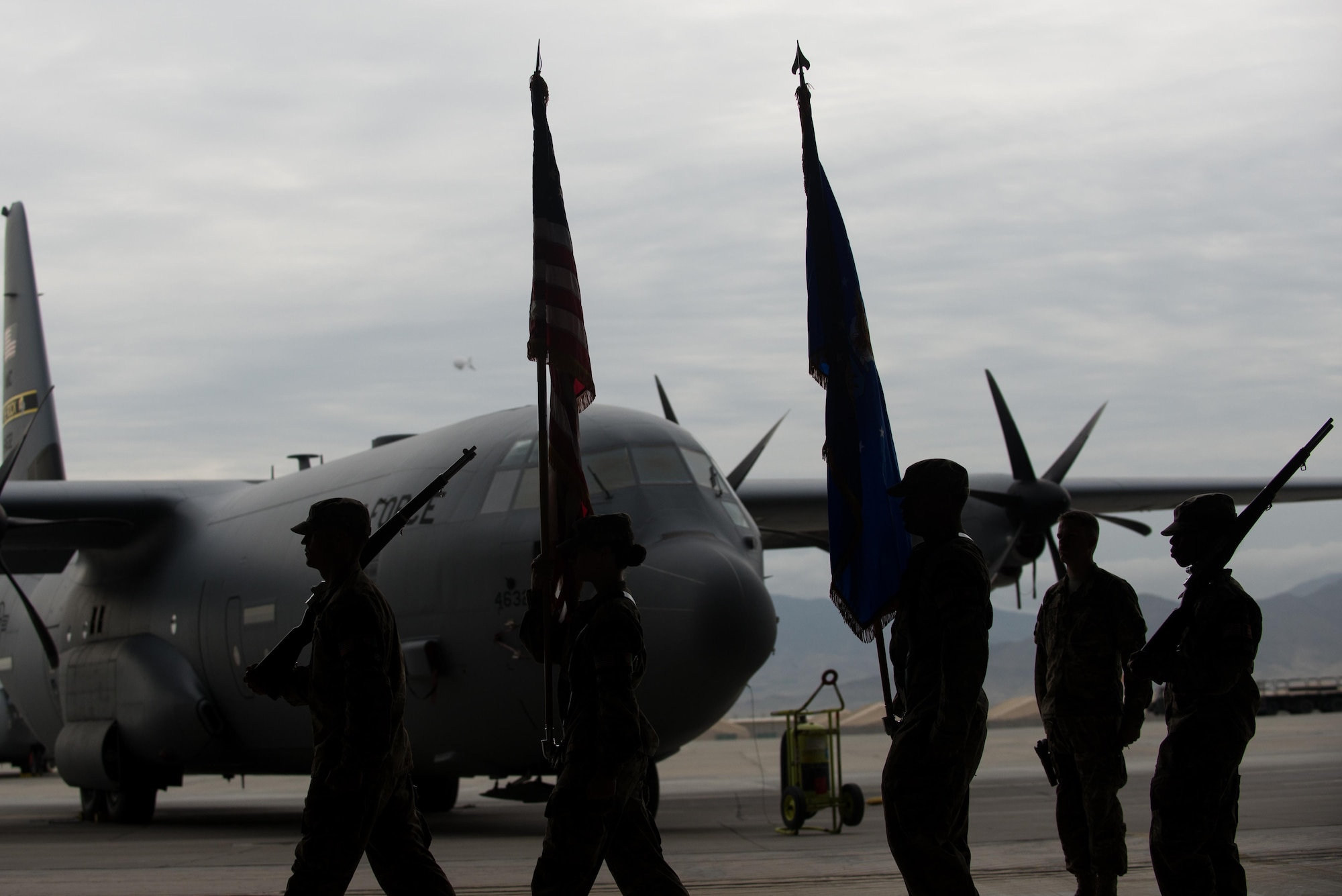 U.S. Airmen with the Bagram Airfield Honor Guard participate in the 455th Expeditionary Operations Group change of command ceremony at Bagram Airfield, Afghanistan, Aug. 3, 2015. The 455th EOG is responsible for all expeditionary flying and aeromedical evacuation operations for the 455th Air Expeditionary Wing. (U.S. Air Force photo by Tech. Sgt. Joseph Swafford/Released)
