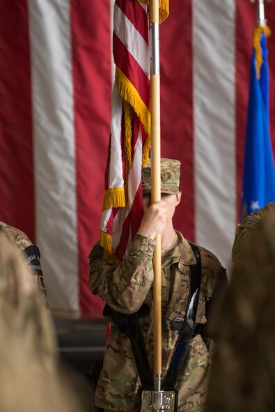 A U.S. Airman with the Bagram Airfield Honor Guard participates in the 455th Expeditionary Operations Group change of command ceremony at Bagram Airfield, Afghanistan, Aug. 3, 2015. The 455th EOG is responsible for all expeditionary flying and aeromedical evacuation operations for the 455th Air Expeditionary Wing. (U.S. Air Force photo by Tech. Sgt. Joseph Swafford/Released)