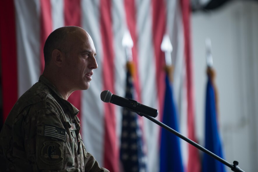 U.S. Air Force Col. Jon Wilkinson, 455th Expeditionary Operations Group commander, speaks during the 455th EOG change of command ceremony at Bagram Airfield, Afghanistan, Aug. 3, 2015. The 455th EOG is responsible for all expeditionary flying and aeromedical evacuation operations for the 455th Air Expeditionary Wing. (U.S. Air Force photo by Tech. Sgt. Joseph Swafford/Released)