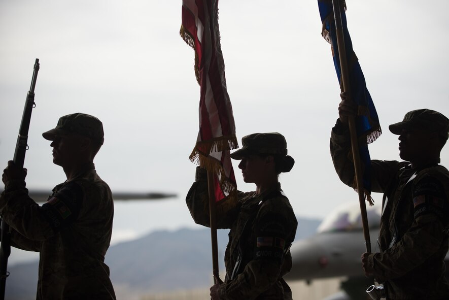 U.S. Airmen with the Bagram Airfield Honor Guard participate in the 455th Expeditionary Mission Support Group change of command ceremony at Bagram Airfield, Afghanistan, Aug. 3, 2015. The 455th MSG is comprised of five squadrons responsible for communications, civil engineer operations, force support, logistics readiness, and security forces. (U.S. Air Force photo by Tech. Sgt. Joseph Swafford/Released)
