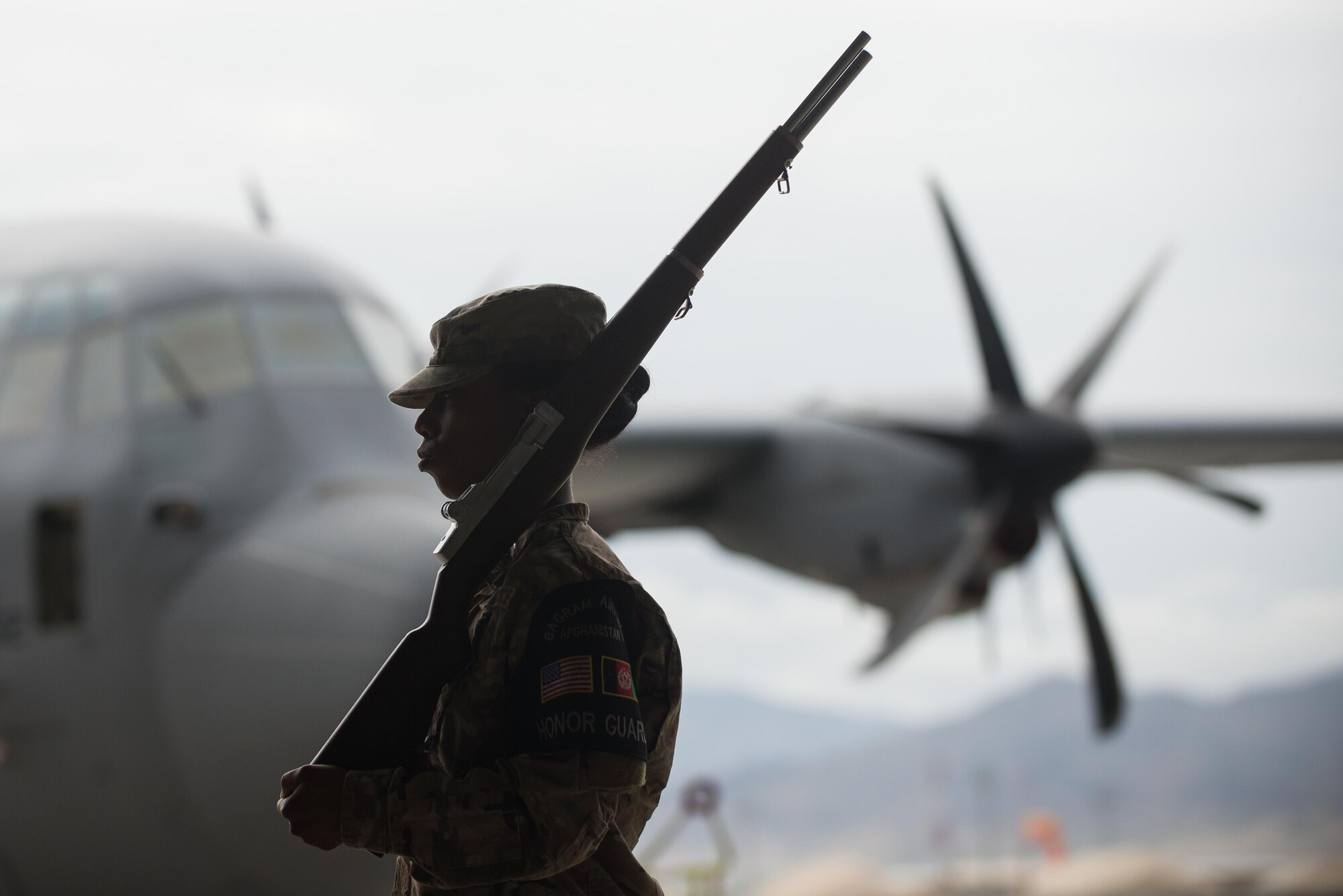 A U.S. Airman with the Bagram Airfield Honor Guard participates in the 455th Expeditionary Mission Support Group change of command ceremony at Bagram Airfield, Afghanistan, Aug. 3, 2015. The 455th MSG is comprised of five squadrons responsible for communications, civil engineer operations, force support, logistics readiness, and security forces. (U.S. Air Force photo by Tech. Sgt. Joseph Swafford/Released)
