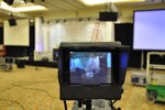 Kentucky National Guard members of the Visual Information and Public Affairs Office prepare for the 2011 National Volunteer Workshop at the Galt House in Louisville, Ky.