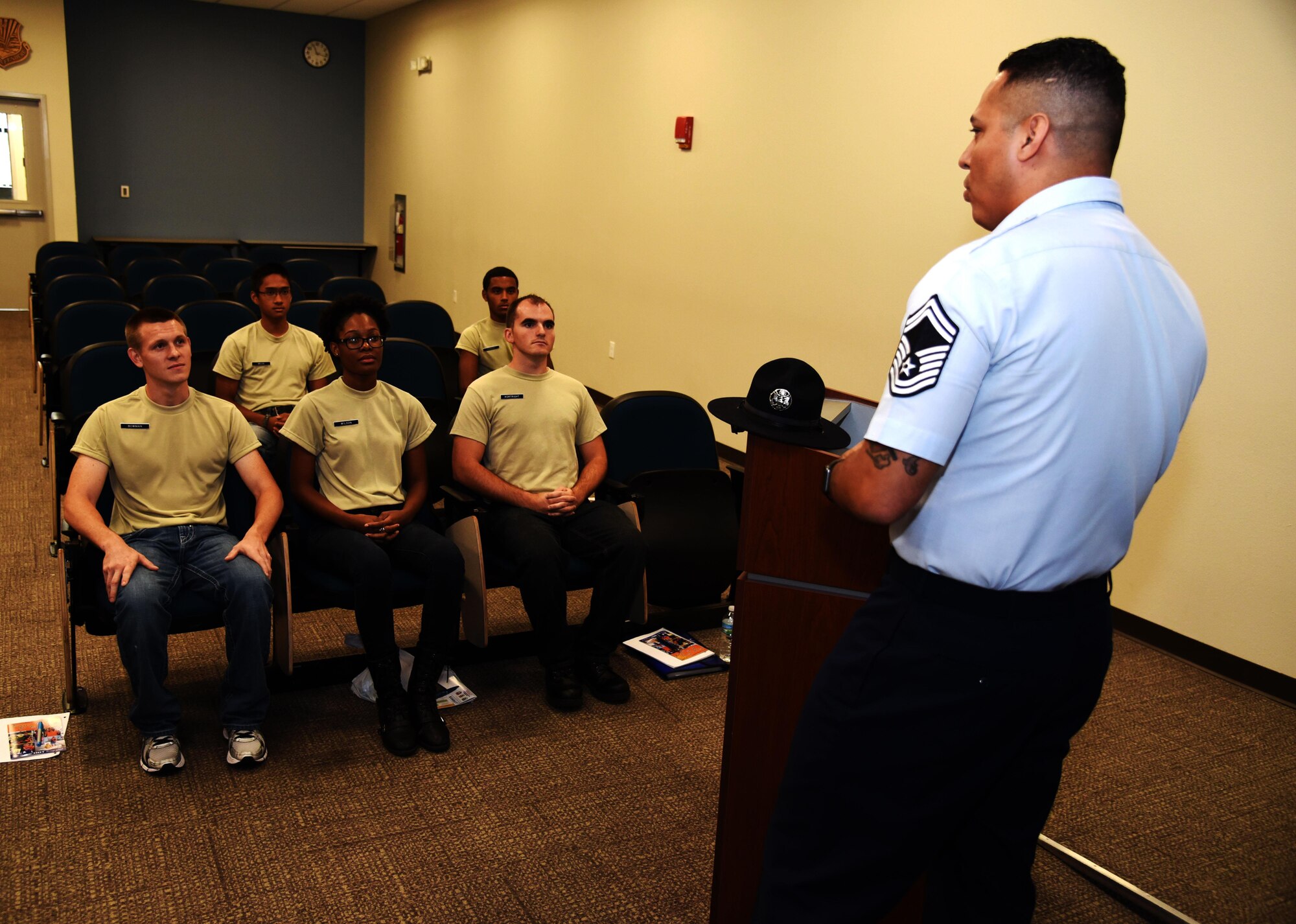 Senior Master Sgt. Ricardo Chavez, Military Training Instructor/433rd Training Squadron superintendent, talks with future Airmen assigned to the 927th Air Refueling Wing developmental training flight during the August Unit Training Assembly at MacDill Air Force Base. MacDill welcomed two MTIs to educate reservists about opportunities to join the MTIs Corps. While the were here, they wanted to meet with the DTF to ensure the future trainees were prepared as they left for Basic Military Training. (U.S. Air Force Photo by Staff Sgt. Adam C. Borgman)