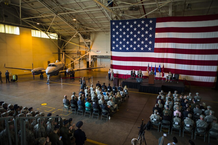 Col. Devin Wooden, 137th Air Refueling Wing commander, addresses members of the 137th ARW during a ceremony at Will Rogers Air National Guard Base, Okla., Aug. 1, 2015. The Oklahoma guard unit is transitioning to the Air Force Special Operations Command. (Air National Guard photo by Senior Airman Tyler Woodward/Released) 