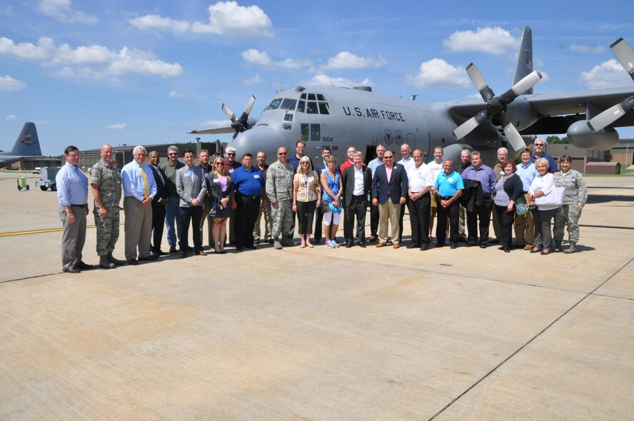 Civic leader flight participants pose for a group photo in front of a 910th Airlift Wing C-130H Hercules aircraft here, July 27. More than 30 civic leaders, including state and local lawmakers, business leaders and organizational representatives, attended the event. The civic leader flight included a C-130 flight over Niagara Falls, installation tour and a tour and briefings at the station’s new USO lounge. (U.S. Air Force photo/Master Sgt. Bob Barko Jr.)