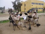 Members of the 42nd Infantry Division Band perform in Iraq.