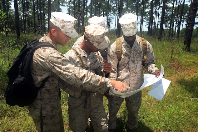 Marines taking the Corporal’s Course at Marine Corps Logistics Base Albany take to the woods with their teams, maps and compasses in search of destinations and locations during the land navigation component of the course. Active-duty and reservist corporals participated in other leadership training activities, which were held at the installation, recently.
