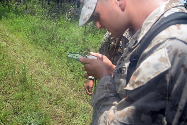 Marines taking the Corporal’s Course at Marine Corps Logistics Base Albany take to the woods with their teams, maps and compasses in search of destinations and locations during the land navigation component of the course. Active-duty and reservist corporals participated in other leadership training activities, which were held at the installation, recently.
