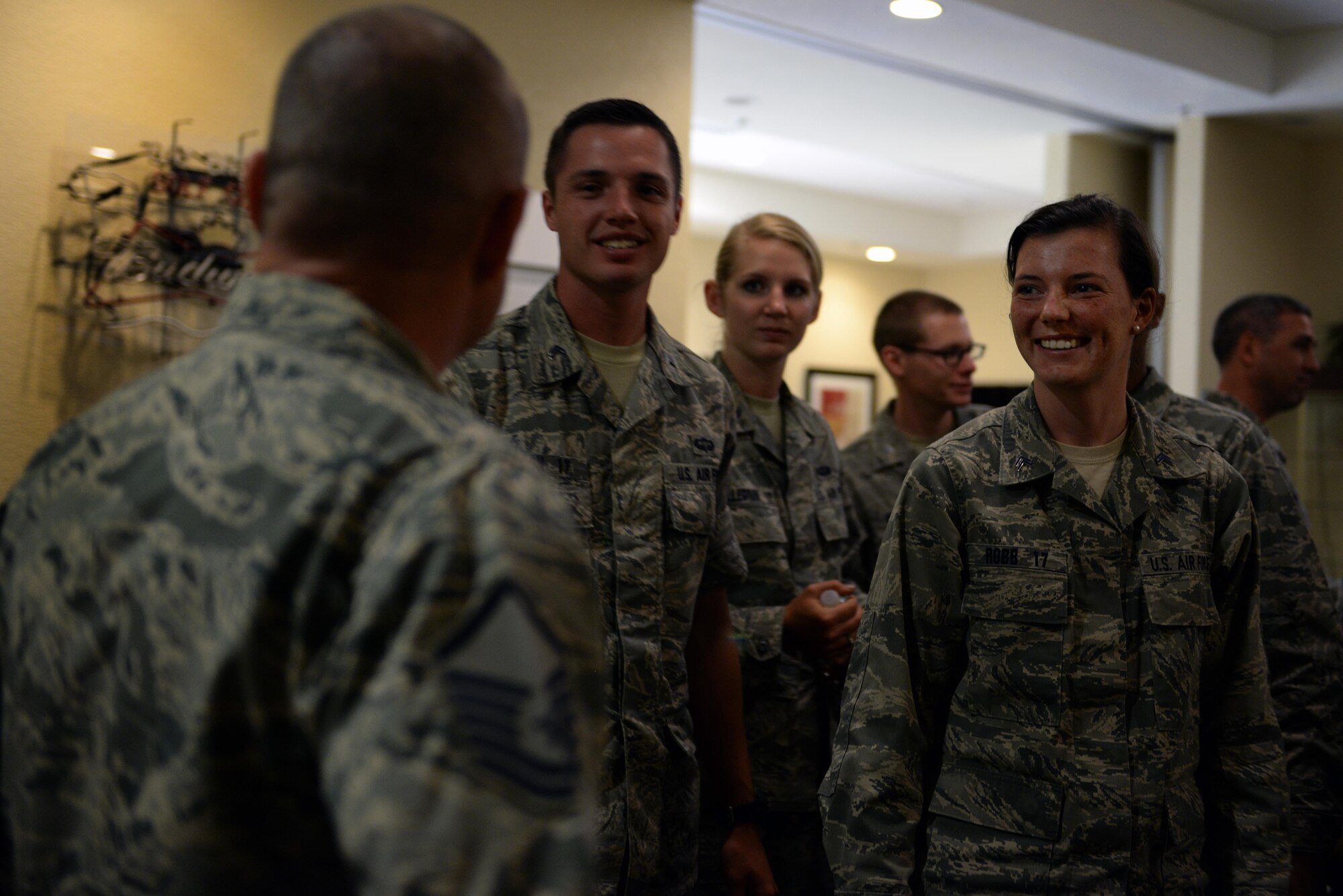 Cadet 2nd Class Stephanie Robb, an Air Force Academy cadet, talks with Master Sgt. Chris Yarborough, 81st Logistics Readiness Squadron deployment and distribution flight superintendent, during a senior NCO mentorship panel as part of Operation Air Force, July 28, 2015, at the Bay Breeze Collocated Club, Keesler Air Force Base, Miss. Available to Academy and ROTC cadets, OAF gives future Air Force officers an in-depth look at what the operational Air Force is like. The cadets toured organizations within the 81st Training Wing and 403rd Wing during their two-week stay. (U.S. Air Force photo by Airman 1st Class Duncan McElroy)