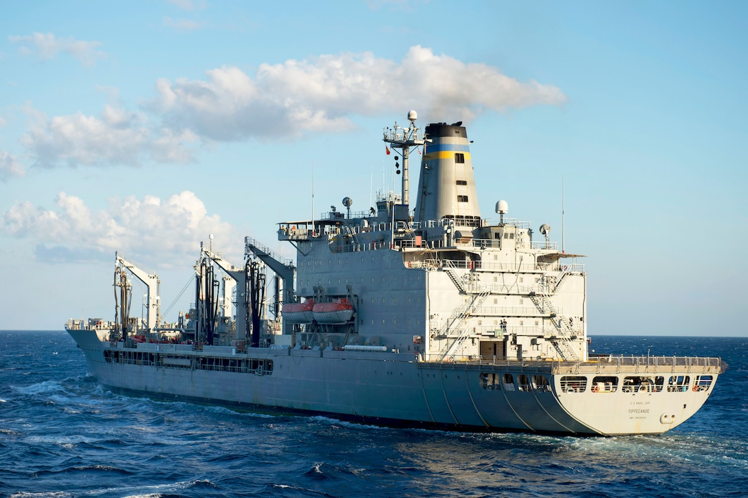The fleet replenishment oiler USNS Tippecanoe steams through the Indian Ocean towards forward-deployed amphibious assault ship USS Bonhomme Richard for a replenishment at sea, July 28, 2015.