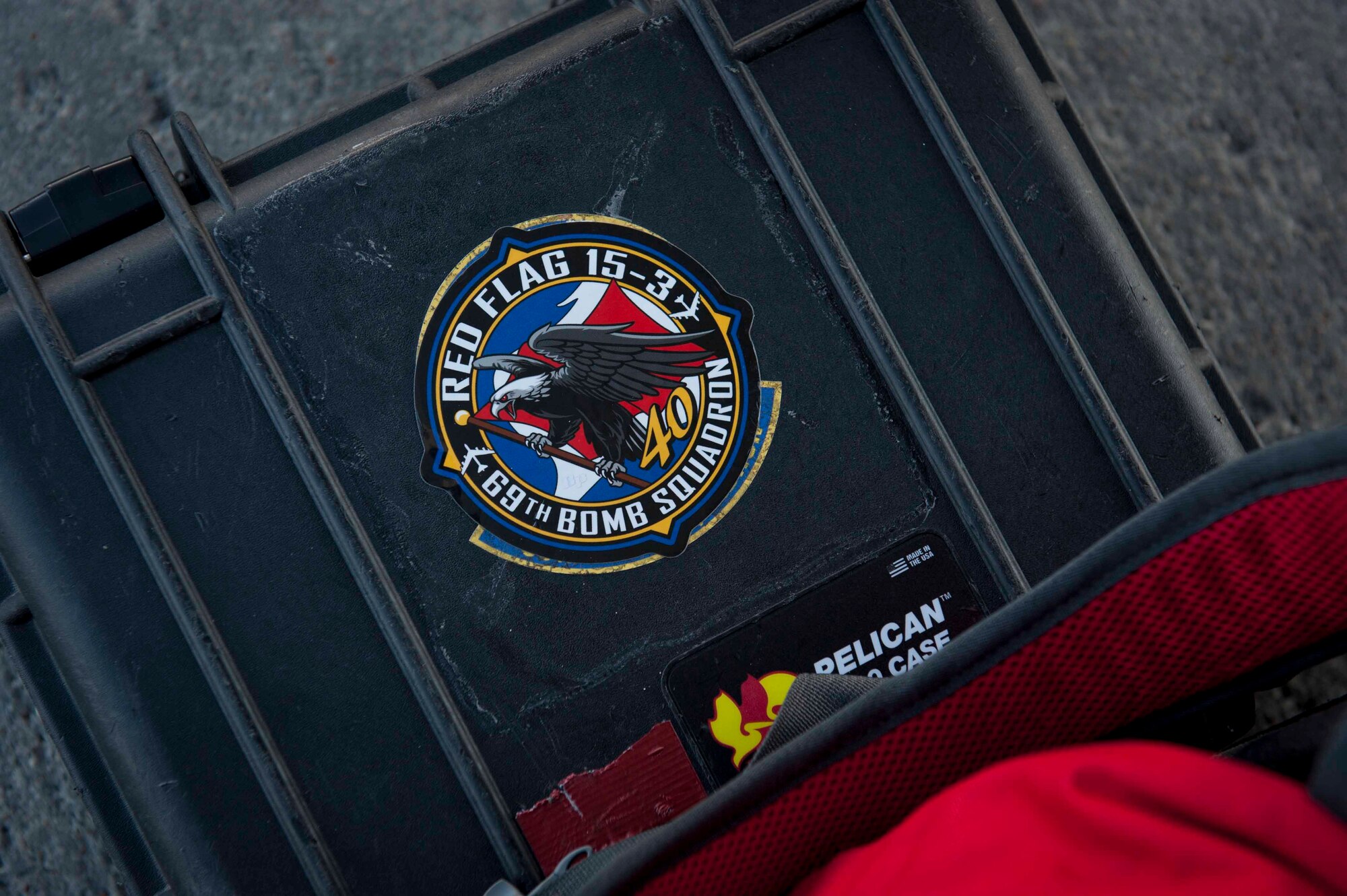 A sticker rests on a piece of luggage at Minot Air Force Base, N.D., July 31, 2015. 69th BS crews returned from a three-week-long exercise, Red Flag 15-3, which took place at Nellis AFB, Nev. (U.S. Air Force photo/Airman 1st Class Sahara L. Fales)