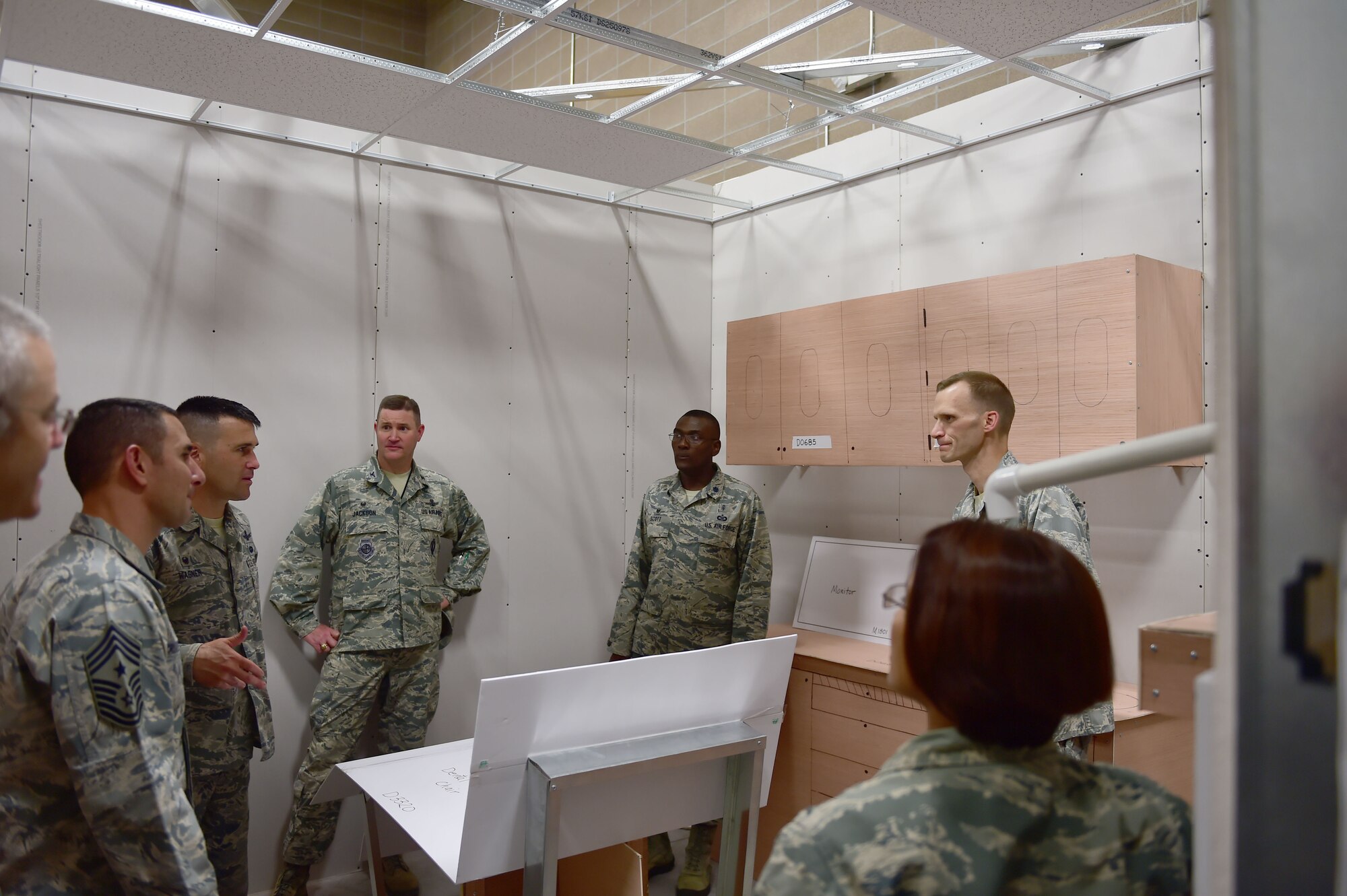 Buckley leadership tours mock dental clinic rooms Aug. 3, 2015, on Buckley Air Force Base, Colo. The expansion and reconfiguration of the 460th MDG and 140th MDG building is expected to be completed June 2016. (U.S. Air Force photo by Airman 1st Class Luke W. Nowakowski/Released)