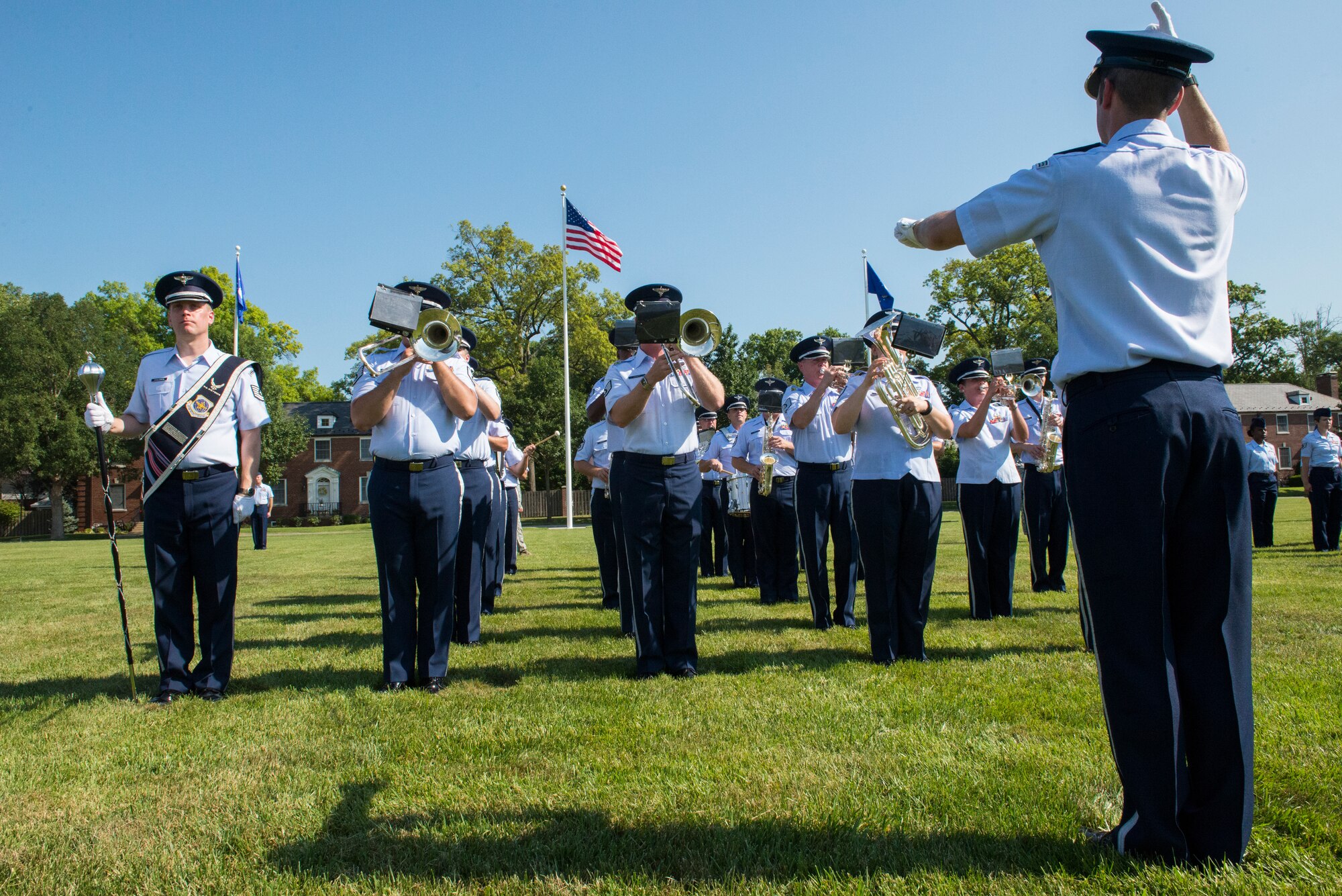 The Air Force Band of Mid America performs the Air Force song during the 375th AMW Change of Command August 3, 2015 on Scott Air Force Base, Illinois. In 1937, Assistant Chief of the Air Corps Brig. Gen. Henry H. Arnold persuaded the Chief of the Air Corps, Maj. Gen. Oscar Westover, that the Air Corps needed an official song reflecting their unique identity in the same manner as the other military services.(U.S. Air Force photo/ Senior Airman Tristin English)