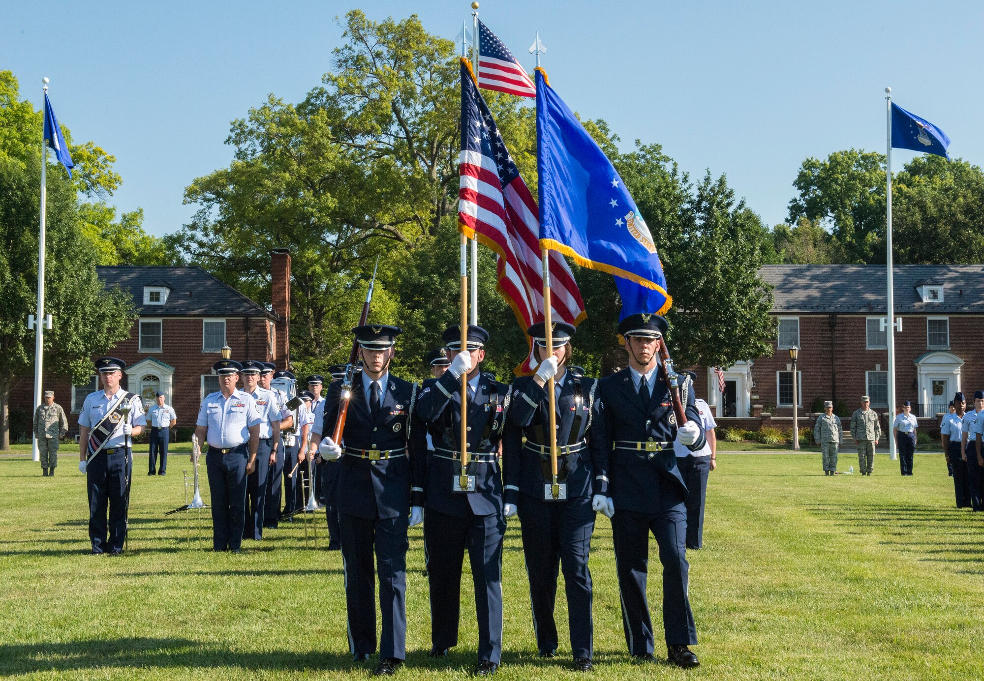 Honor Guard marches to the front of the parade field for the advancement of colors during the 375th AMW Change of Command August 3, 2015 on Scott Air Force Base, Illinois. Colonel Laura Lenderman former Chief, Analysis Branch, Program and Budget Analysis Division, Joint Staff J-8 in Washington D.C. was selected to take command, while Col. Kyle Kremer was picked to take charge of United States Transportation Command. (U.S. Air Force photo/ Senior Airman Tristin English)