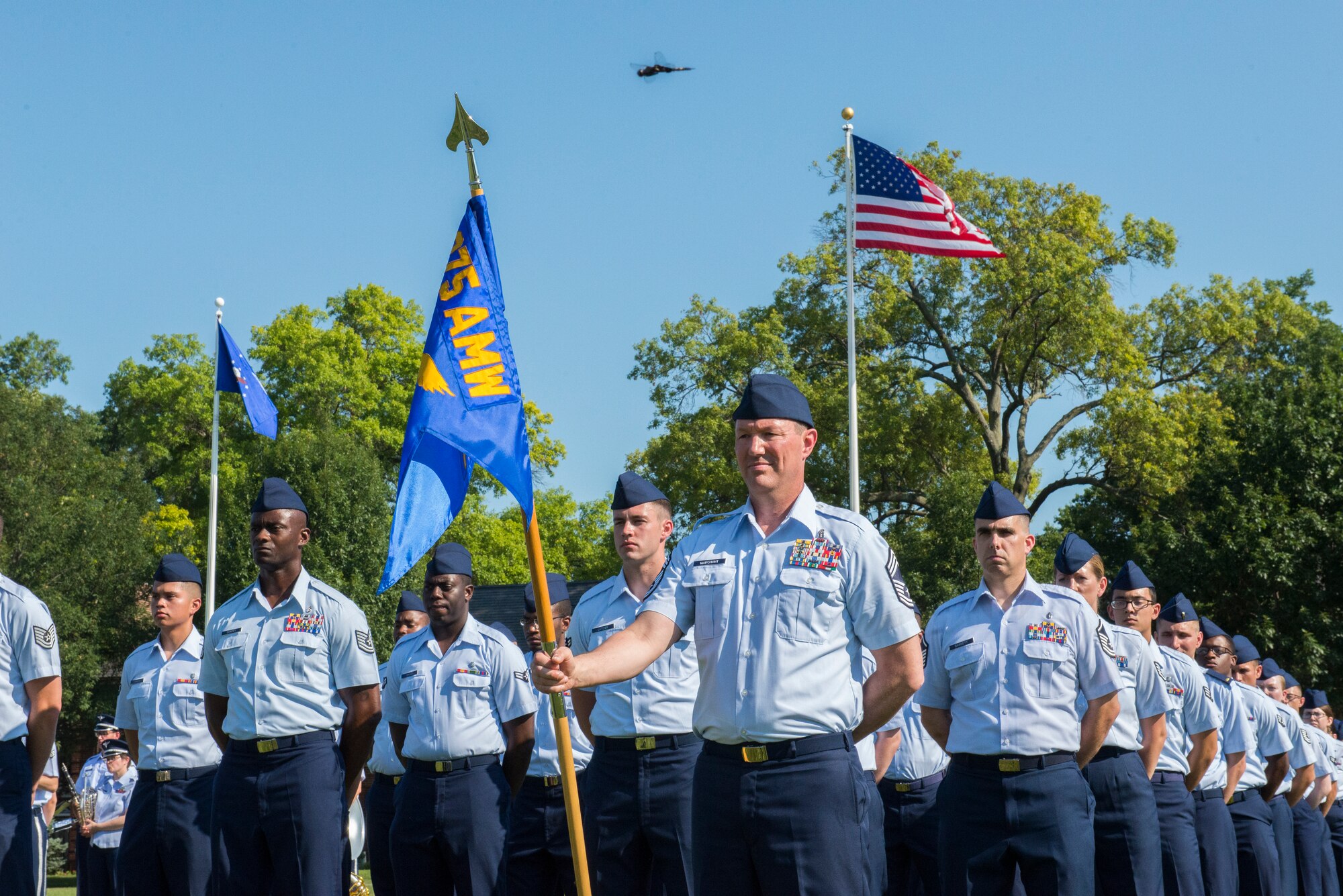 Squadrons from the 375th Air Mobility Wing stand at parade rest while awaiting commands during the 375th AMW Change of Command August 3, 2015 on Scott Air Force Base, Illinois. Colonel Laura Lenderman assumes command after serving two years as the Chief, Analysis Branch, Program and Budget Analysis Division, Joint Staff J-8 in Washington D.C. (U.S. Air Force photo/ Senior Airman Tristin English) 