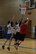 Logan Anderson, 56th Logistics Readiness Squadron team member, shoots the ball during a match with Army Recruiters during the intramural basketball season at Luke Air Force Base. The game went to LRS with a final score of 55-22.