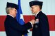 U.S. Air Force Gen. Hawk Carlisle, left, commander of Air Combat Command, pins a Distinguished Service Medal on Maj. Gen. H. D. Polumbo Jr. during the 9th Air Force change of command ceremony at Shaw Air Force Base, S.C., July 31, 2015. Polumbo relinquished command of 9th Air Force and retired after a 34-year Air Force career. (U.S. Air Force photo by Senior Airman Diana Cossaboom/Released) 