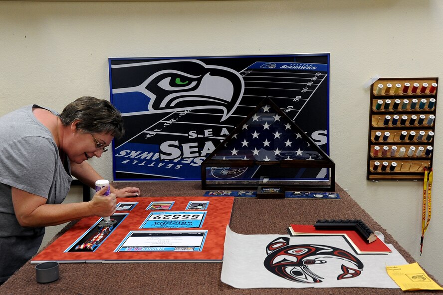 Kim Caley, 56th Force Support Squadron Arts and Crafts operation manager, works on a project at Luke Air Force Base. The arts and crafts center helps Airman moral with arts, crafts or wood projects. (U.S. Air Force photo by Airman 1st Class Pedro Mota)