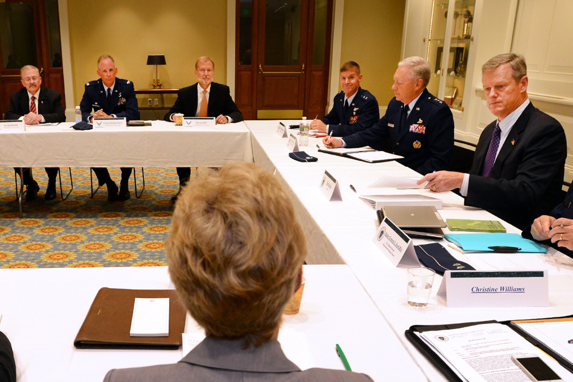 Mass. Gov. Charlie Baker and key members of his staff meet with Lt. Gen. John Thompson, Air Force Life Cycle Management Center commander, and officials from Hanscom AFB at the Mass. Statehouse Aug. 3. Participants discussed a range of ongoing and potential future collaboration efforts covering workforce development, technology development, business outreach and base infrastructure enhancements. (Photo: Joanne DeCaro/Governor's Office)
