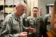 Tech. Sgt.  Robert Fekken, NCO in charge of reverse dignified transfers, explains the series of movements necessary during training at the Charles C. Carson Center for Mortuary Affairs, Dover Air Force Base, Del., July 24,  2015. Airmen assigned to Dover AFB support the Air Force Mortuary Affairs Operations' mission by performing the reverse dignified transfer for the fallen.  (U.S. Air Force photo by Senior Airman Robert Gunn)