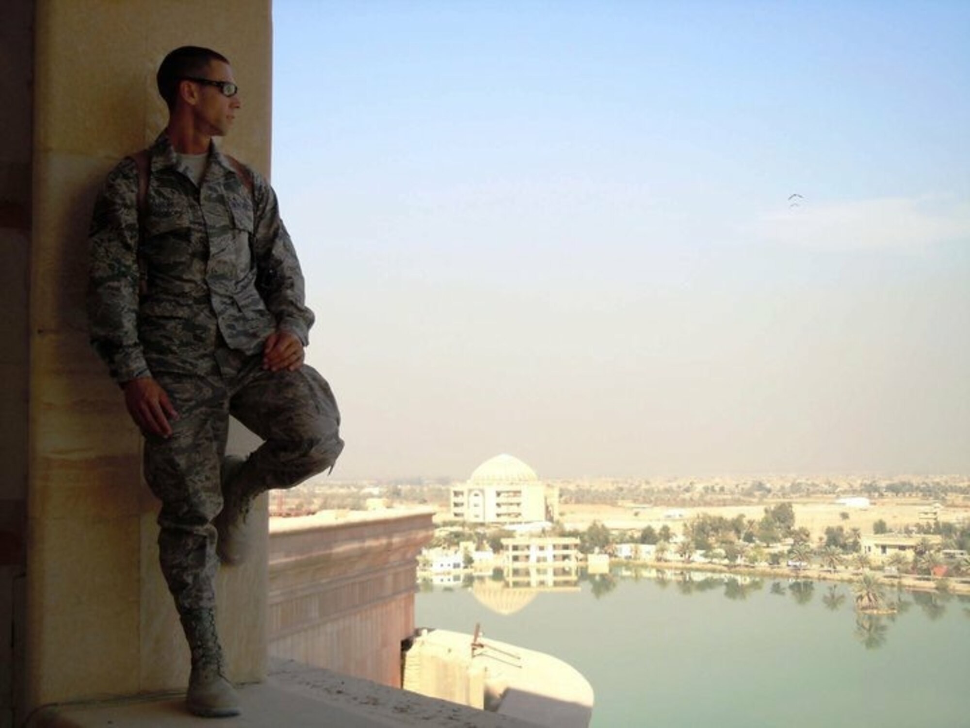 Second Lt. Shaun Chaplain, 56th Comptroller Squadron flight commander, surveys his surroundings at an unnamed deployed location when he was still an enlisted member. From a technical sergeant in cyber operations, he became a second lieutenant three months ago after completing Officer Training School. Luke Air Force Base is his first assignment as an officer.