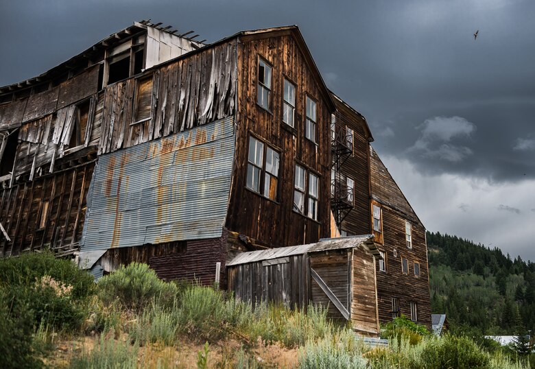 A weathered and beaten hotel lies in the forgotten town of Silver City, Idaho. Once a bustling mining settlement, it's veins have run dry and abandon mine shafts litter the Mountainside. (U.S. Air Force photo by Airman 1st Class Connor J. Marth)