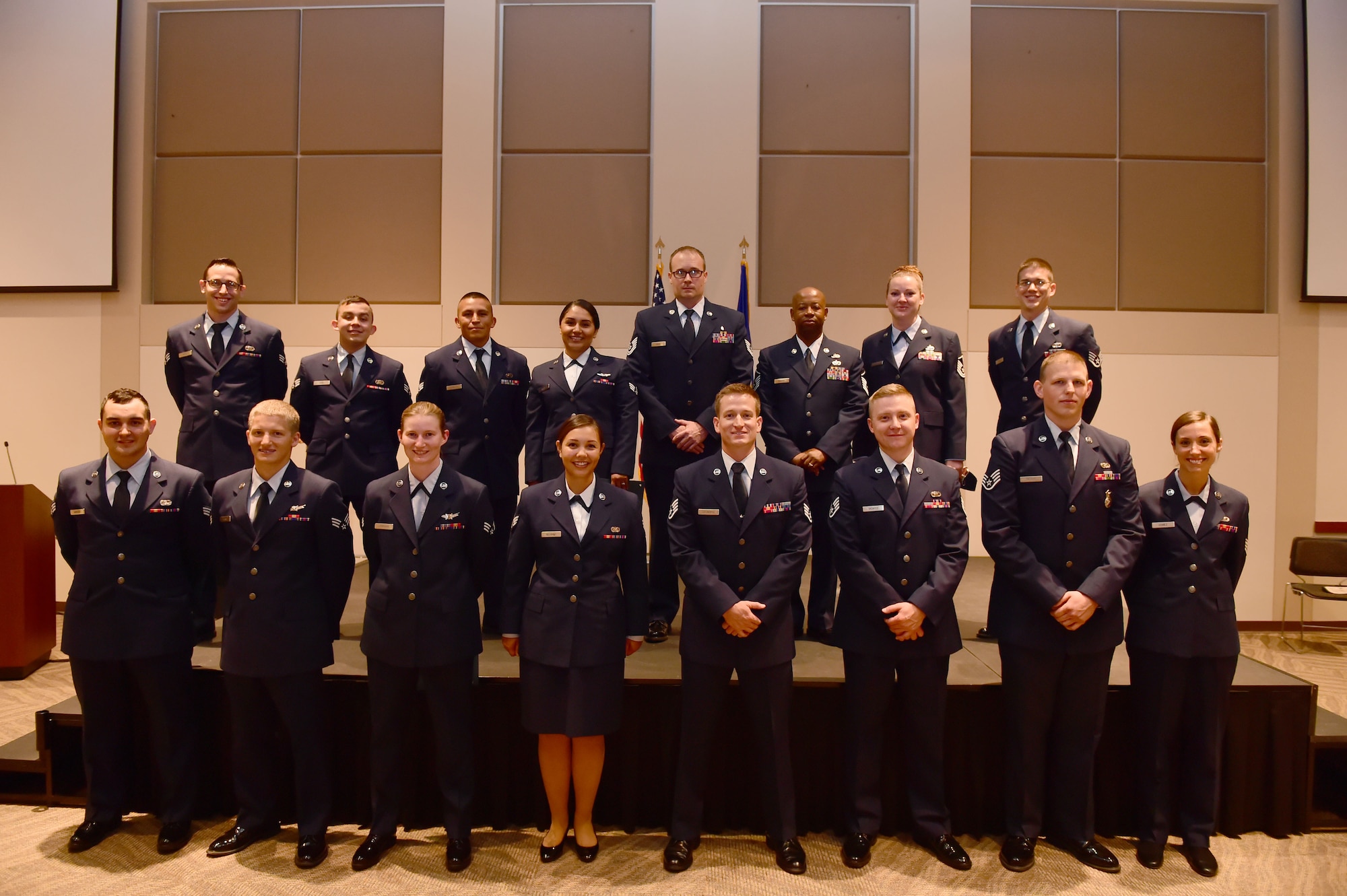 Sixteen Team Buckley members were promoted to their next ranks July 31, 2015, at the Leadership Development Center at Buckley Air Force Base, Colo. A promotion ceremony is a time-honored tradition in the Air Force, allowing co-workers, family and friends to support and congratulate Airmen on their promotion. (U.S. Air Force photo by Airman 1st Class Luke W. Nowakowski/Released)