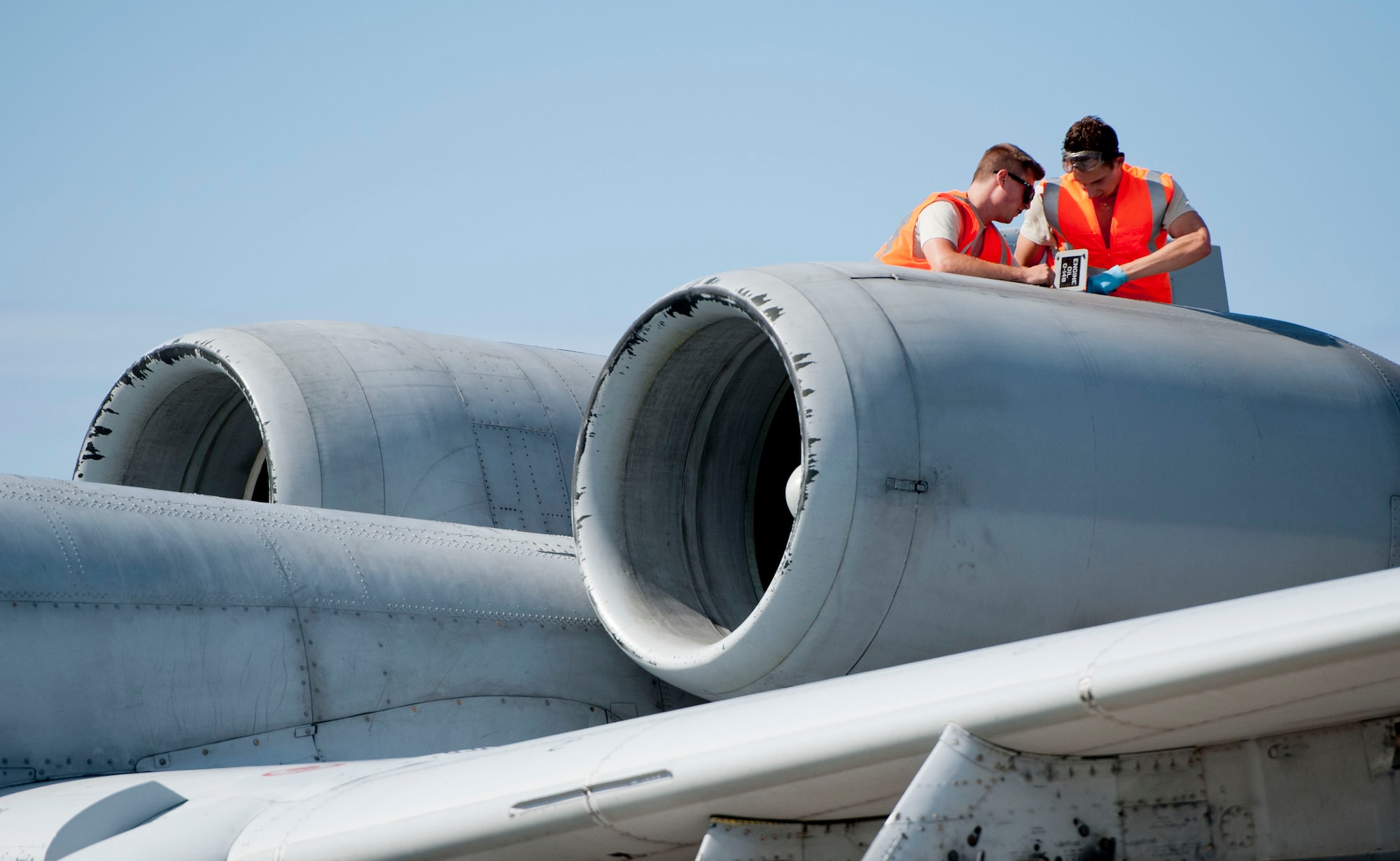 Staff Sgt. Justin Smith and Senior Airman Samuel Clark, both 65th Operations Support Squadron transient alert maintenance technicians, perform maintenance checklists on an A-10 Thunderbolt II on Lajes Field, Azores, Portugal, August 1, 2015. The 354th Expeditionary Fighter Squadron returns home after deploying 12 A-10s as part of a Theater Security Package in support of Operation Atlantic Resolve, to Spangdahlem AB, Germany where they conducted training alongside our NATO allies to strengthen interoperability and to demonstrate U.S. commitment to the security and stability of Europe. (U.S. Air Force photo by Master Sgt. Bradley C. Church).