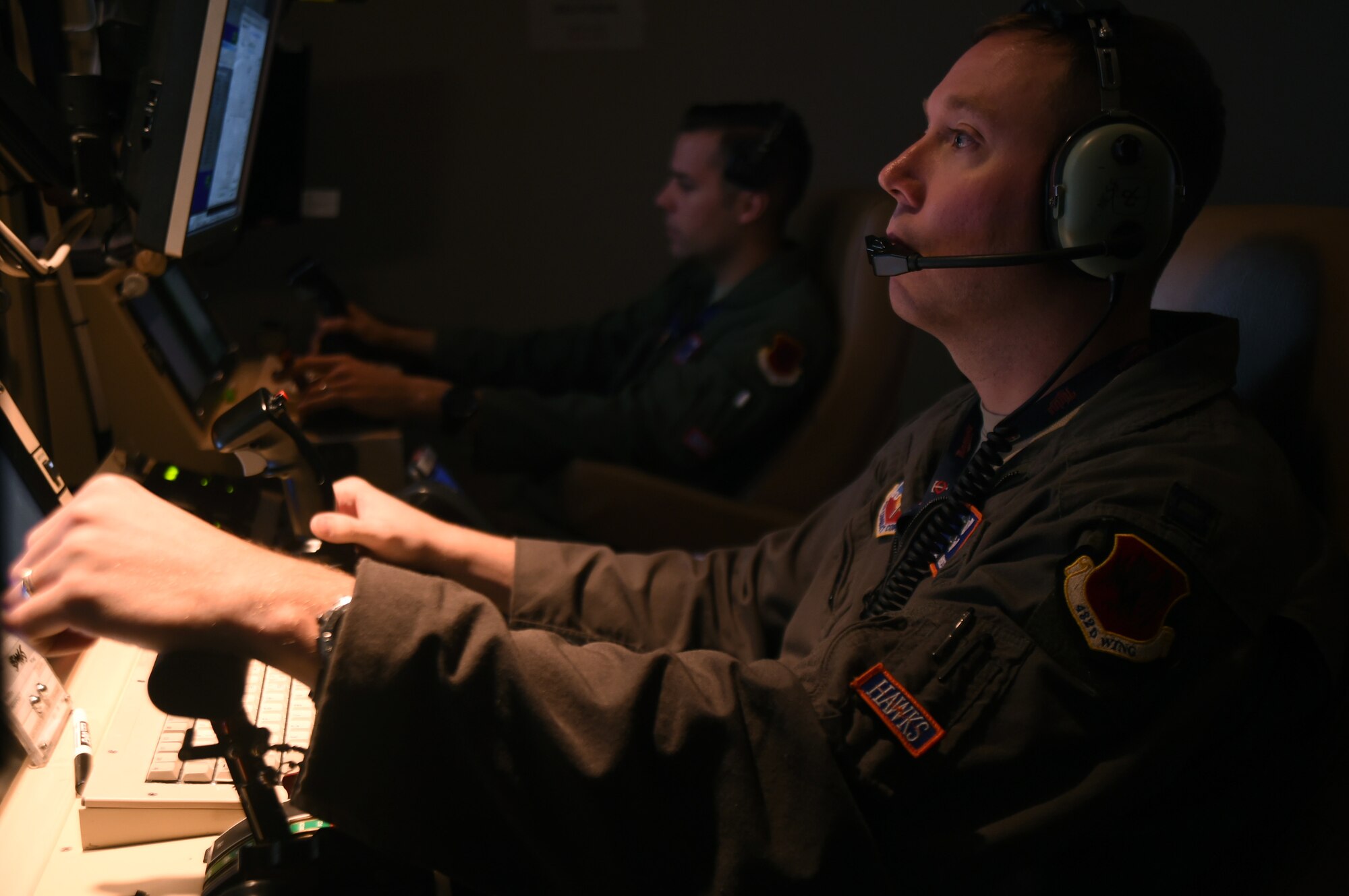 Capt. Benjamin, 18th Reconnaissance Squadron MQ-1 Predator pilot, flies a remotely piloted aircraft training sortie in support of Red Flag 15-3 at Creech Air Force Base, Nevada on July 23, 2015. Red Flag is a training tool used to build confidence, familiarity, and relationships among warfighters involved, including those with little to no experience partnering with other aircraft or ground personnel. (U.S. Air Force photo by Tech. Sgt. Nadine Barclay)