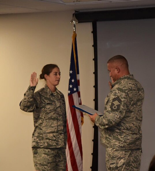 Chief Master Sgt. Erin Willis 927th Maintenance Group superintendent, was promoted to her current rank in front of family, friends and Airmen during a promotion ceremony held during the August Unit Training Assembly here. With only one percent of the enlisted force holding the distinguished rank of chief master sergeant, Airmen from the 927th Air Refueling Wing were on-hand for the promotion. (U.S. Air Force photo by Staff Sgt. Adam Borgman) 