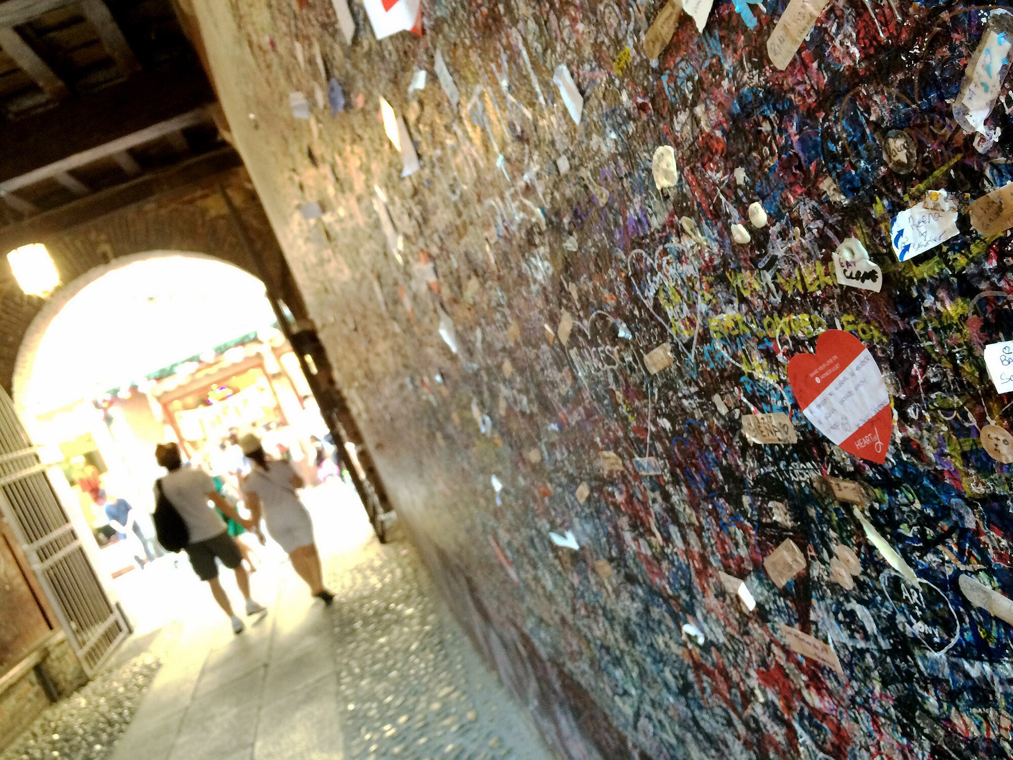 The corridor leading to Juliet’s house is littered with love notes, bandages and stickers in Verona, Italy. People visit the house of William Shakespeare’s fictional character daily to secure locks on walls, write letters to Juliet, or to touch her statue – all for good luck in love. (U.S. Air Force photo by Staff Sgt. R.J. Biermann/Released)