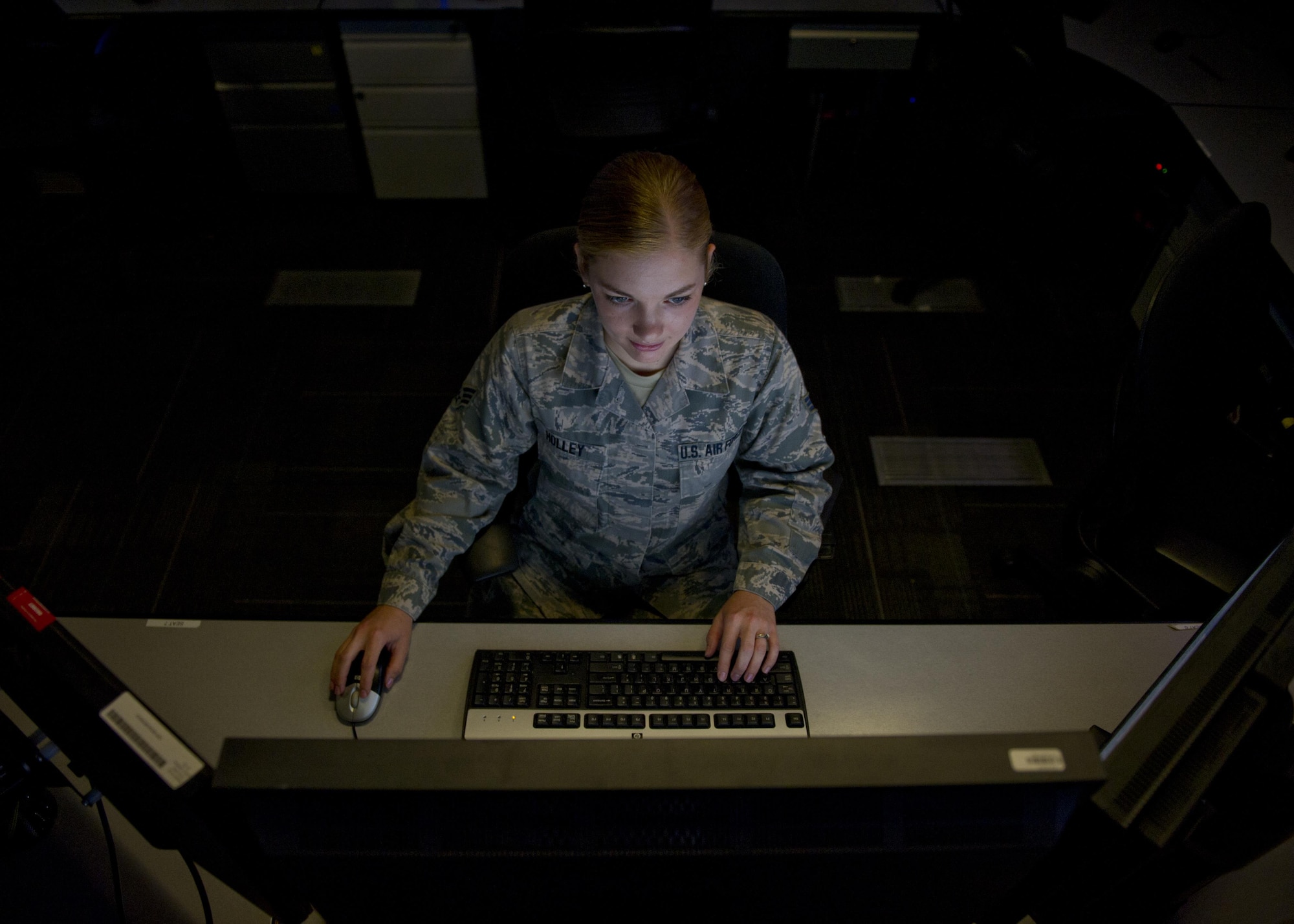 Senior Airman Meaghan Holley conducts mission operations June 30, 2015. Holley was named one of the 12 Outstanding Airmen of the Year in an announcement from the Air Force Personnel Center Monday, July 27, 2015. (U.S. Air Force photo by Senior Airman Justyn M. Freeman)