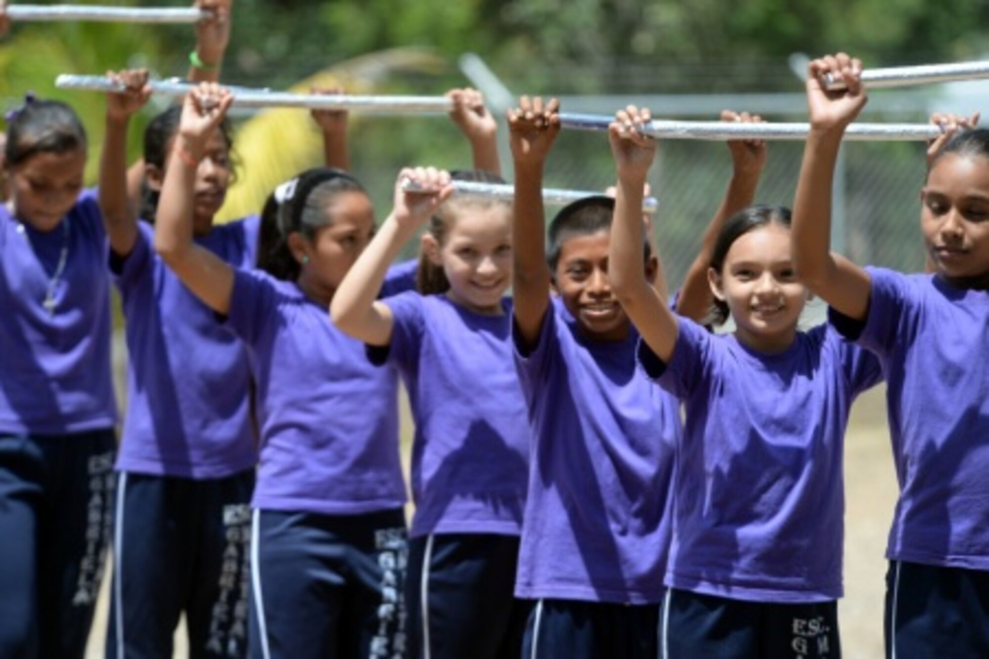 Gabriela Mistral students perform a modern dance during the ribbon-cutting ceremony at the Gabriela Mistral school in Ocotes Alto, Honduras, July 28, 2015. The ribbon-cutting ceremony celebrated the opening of the new two-classroom schoolhouse. The schoolhouse was one of the key projects that occurred as part of the New Horizons Honduras 2015 training exercise taking place in and around Trujillo, Honduras. New Horizons was launched in the 1980s and is an annual joint humanitarian assistance exercise that U.S. Southern Command conducts with a partner nation in Central America, South America or the Caribbean. The exercise improves joint training readiness of U.S. and partner nation civil engineers, medical professionals and support personnel through humanitarian assistance activities. (U.S. Air Force photo by Capt. David J. Murphy/Released)
