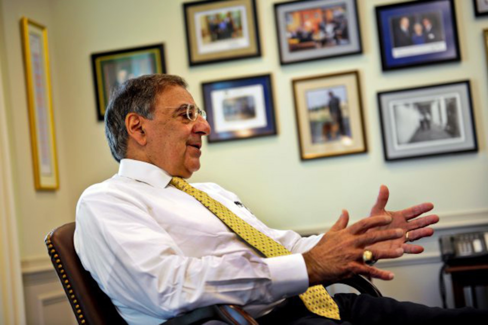Defense Secretary Leon Panetta responds to a question from a member of the military press in his office at the Pentagon, Aug. 19, 2011. Writers representing American Forces Press Service, Stars and Stripes, and the Military Times Media Group attended a roundtable discussion and asked Secretary Panetta a variety of security and military forces related questions.