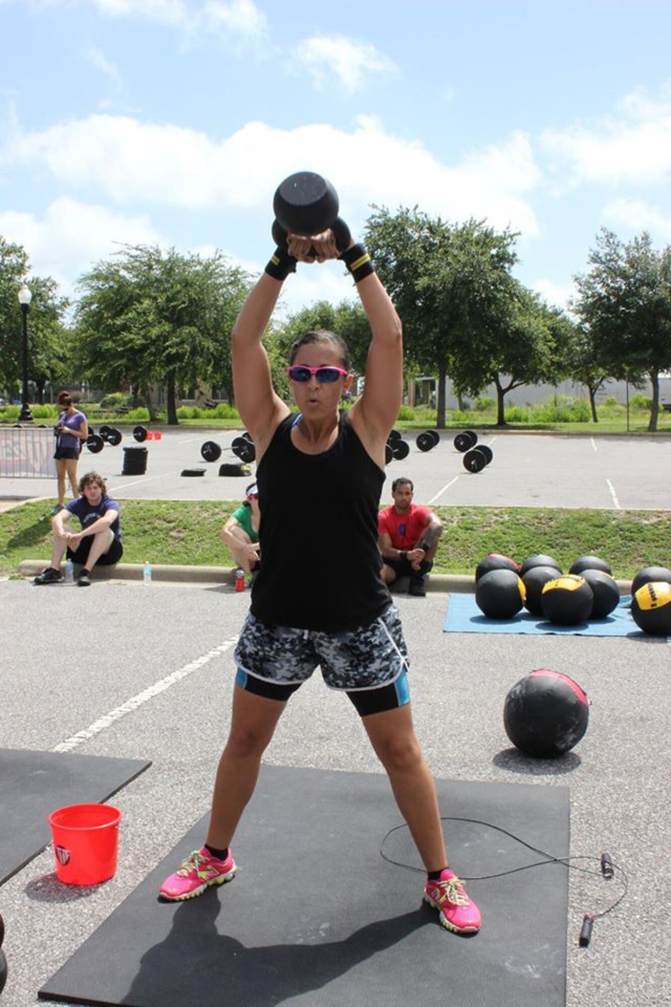Master Sgt. Gloria Bermúdez-Bly, Air Force Special Operations Command security forces integrated defense program manager, competes in the TuF Games, a CrossFit competition, in Pensacola, Fla., June 13, 2015. She is AFSOC’s nominee for the 2015 National LATINA Symposium Distinguished Service award. (Courtesy photo)