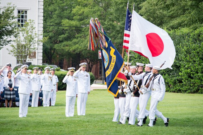 In this file photo, Chief of Naval Operations (CNO) Adm. Jonathan Greenert welcomes Chief of Staff of the Japan Maritime Self-Defense Force Adm. Tomohisa Takei with a full honors ceremony at the Washington Navy Yard. 