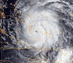 A GOES-13 infrared satellite image provided by the U.S. Naval Research Laboratory, Monterey, Calif., shows the status of Hurricane Irene at about 6 a.m. EDT, Aug. 24, 2011. Irene crossed over the Bahamas with 115-mph winds. The storm could strike the U.S. East Coast between Florida and the Carolinas as a Category 3 hurricane.