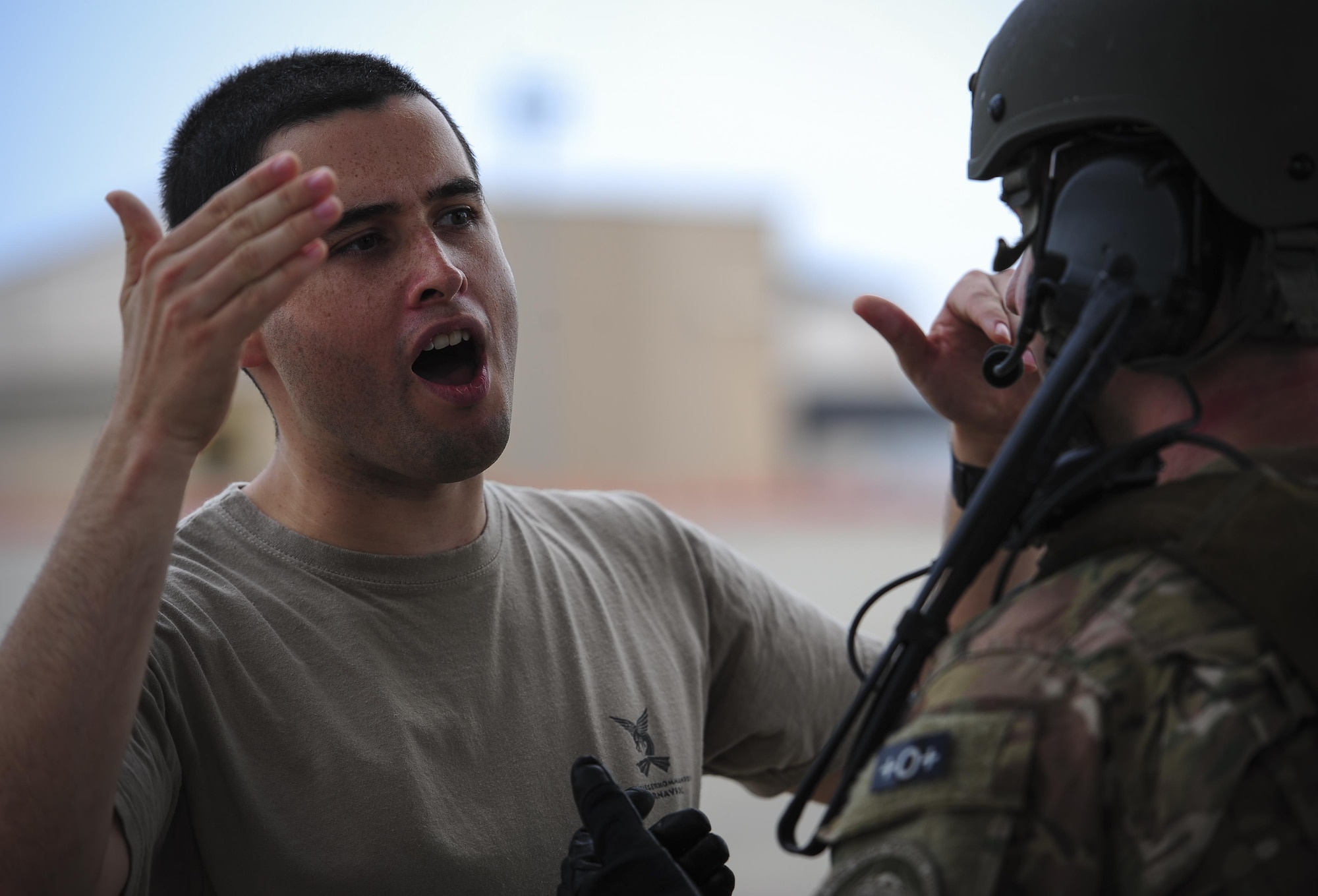 Tech. Sgt. Robert Laxton, 1st Special Operations Air Operations Squadron NCO-in-charge of wing theater planning, acts as a member of opposition forces who is simulating an attempt to gain access to an aircraft during a task force exercise on the flight line at Hurlburt Field, Fla., July 24, 2015. Exercise scenarios included downed aircraft site security and armed escort. Through the scenarios, DAGRE was able to accomplish multiple training objectives including close quarters combat, small unit tactics, flight deck denial, fly away security, close air support, casual evacuation and more. (U.S. Air Force photo by Senior Airman Meagan Schutter)