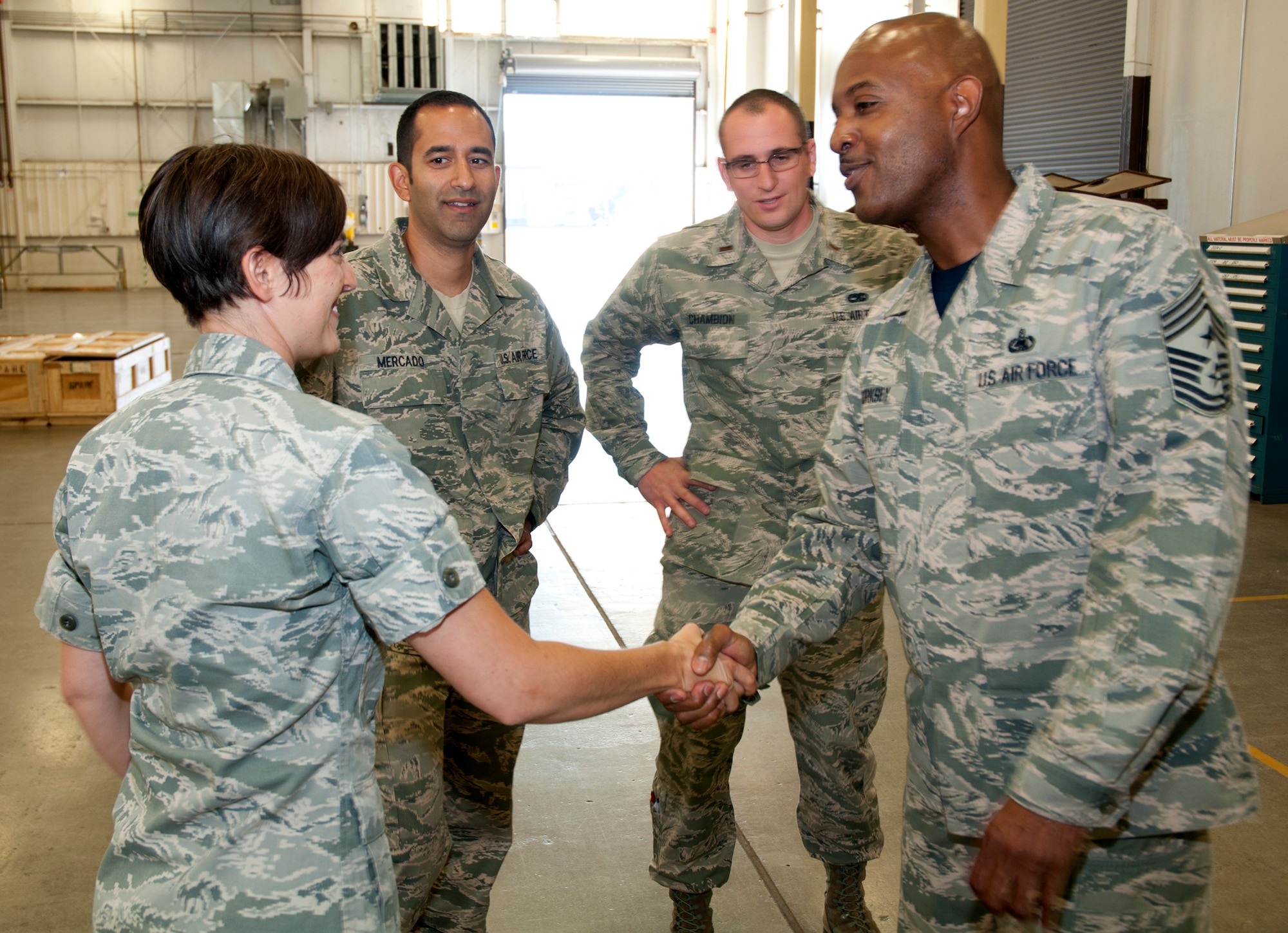 Chief Master Sgt. Cameron Kirksey shakes hand with Capt. Angela Allardice
after visiting the 446th Maintenance Squadron fabrication flight at Joint
Base Lewis-McChord, Wash., Aug. 1, 2015. Kirksey, the Air Force Reserve
Command command chief, visited with members of the 446th Airlift Wing Aug.
1-2 to gain a better perspective on their mission of strategic airlift and
airdrop as well as any issues the Air Force Reservists face. (U.S. Air Force
photo/2nd Lt. Stephen J. Collier)
