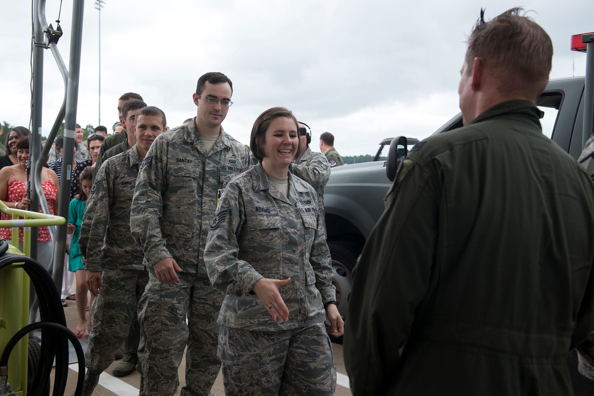 Airmen from the 23d Fighter Group congratulate U.S. Air Force Col. Derek Oaks, 23d FG commander, after his final flight Aug. 3, 2015, at Moody Air Force Base, Ga. Oaks directed the largest A-10C Thunderbolt II operational fighter group consisting of the 74th and 75th Fighter Squadrons and the 23d Operations Support Squadron for two years. (U.S. Air Force photo by Airman 1st Class Kathleen D. Bryant/Released)


