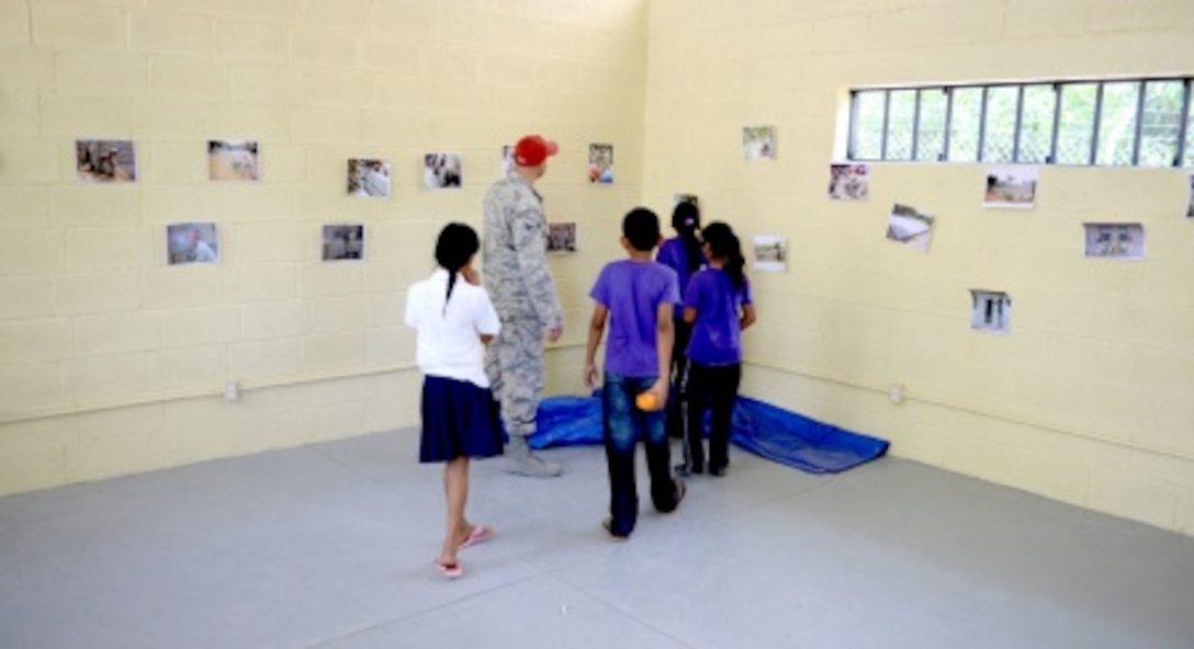 Retired Air Force Brig. Gen. Charles Potter (left) and Army Col. James Carrell (right) received their awards for their service to the health care field from Richard Umbdenstock, American Hospital Association president and CEO. Courtesy photo. 