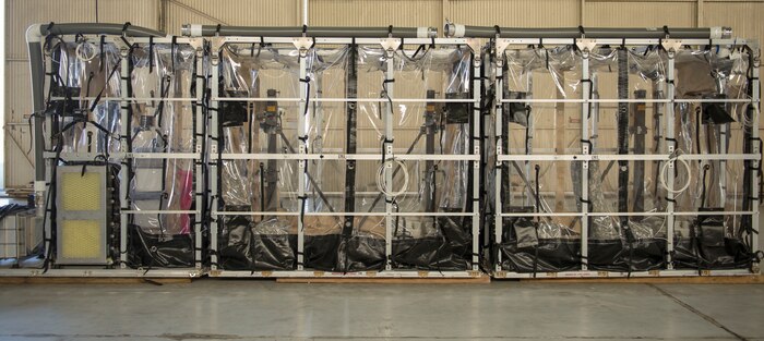 The Transport Isolation System was described to Brig. Gen. Kory Cornum, the surgeon general for Air Mobility Command, on July, 30, 2015 in building 575 on the flight line at Joint Base Charleston, S.C.  The TIS is an asset the Department of Defense uses to safely transport patients with highly contagious diseases such as Severe Acute Respiratory Syndrome or the Ebola Virus. (U.S. Air Force photo/ Thomas T. Charlton)