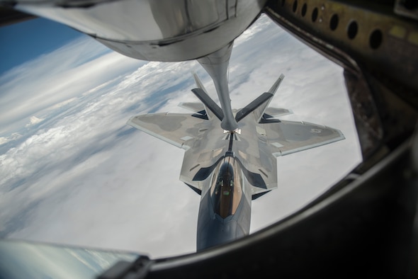 An F-22A Raptor from the 95th Fighter Squadron stationed with the 325th Fighter Wing, Tyndall Air Force Base, Florida, prepares to refuel from a KC-135 Stratotanker from the 93rd Air Refueling Squadron from Fairchild AFB, Washington, during Red Flag 15-3 at Nellis AFB, Nev., July 31, 2015. Flying units from around the Department of Defense deploy to Nellis AFB to participate in Red Flag exercises that are typically held three times a year and organized by the 414th Combat Training Squadron. (U.S. Air Force photo by Senior Airman Brittany A. Chase)