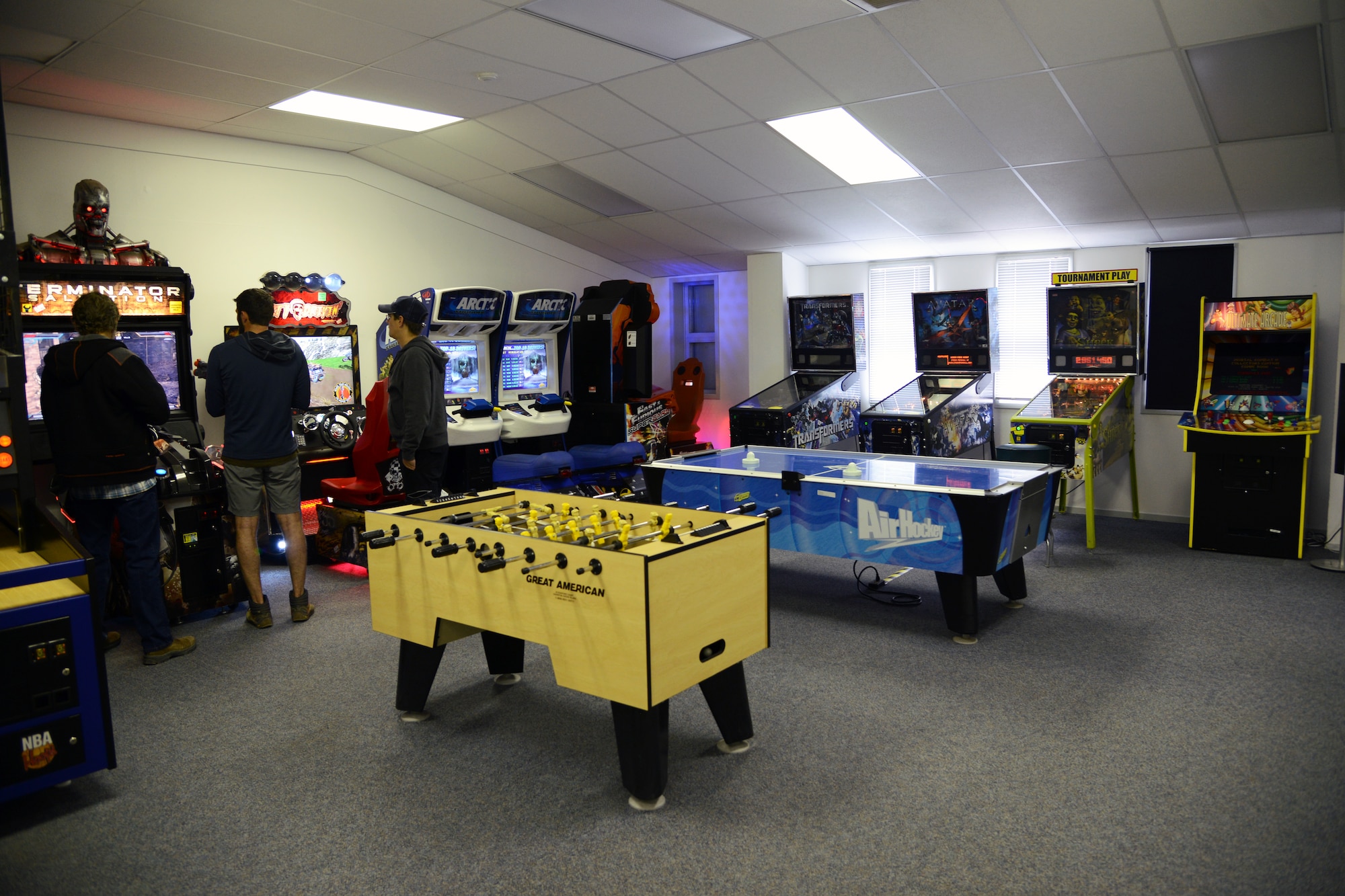 THULE AIR BASE, Greenland – Thule Airmen take advantage of the game room during their off-duty hours. Activities offered by Greenland Contractors, as part of the base maintenance contract, activities at the Top of the World Club, Chapel, and other support services, help Airmen adapt to the remote tour at the most remote installation in the Air Force. (U.S. Air Force photo by Tech. Sgt. Jared Marquis)