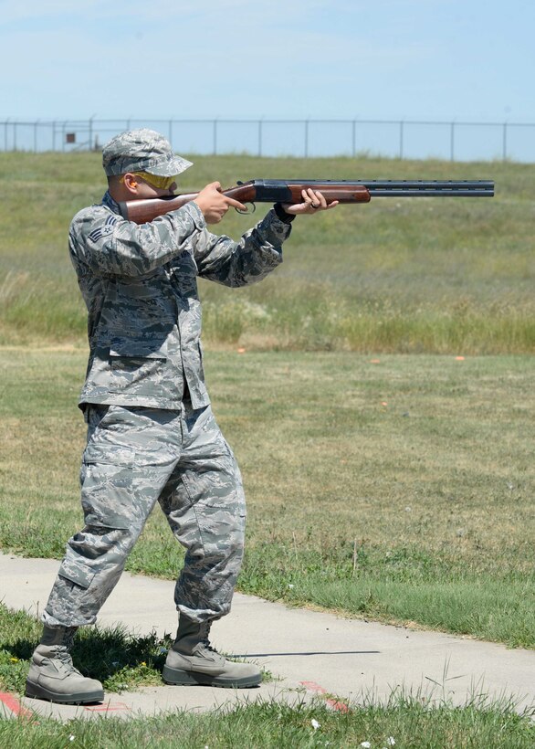 Senior Airman Robert Ocampo, 28th Contracting Squadron contract administrator, participates in a trap and skeet event hosted by Chief Master Sgt. Kevin Peterson, 28th Bomb Wing command chief, at Ellsworth Air Force Base, S.D., July 23, 2015. Peterson treated base Airmen to a free lunch and a chance to take part in a trap and skeet event. (U.S. Air Force photo by Senior Airman Rebecca Imwalle/Released)
