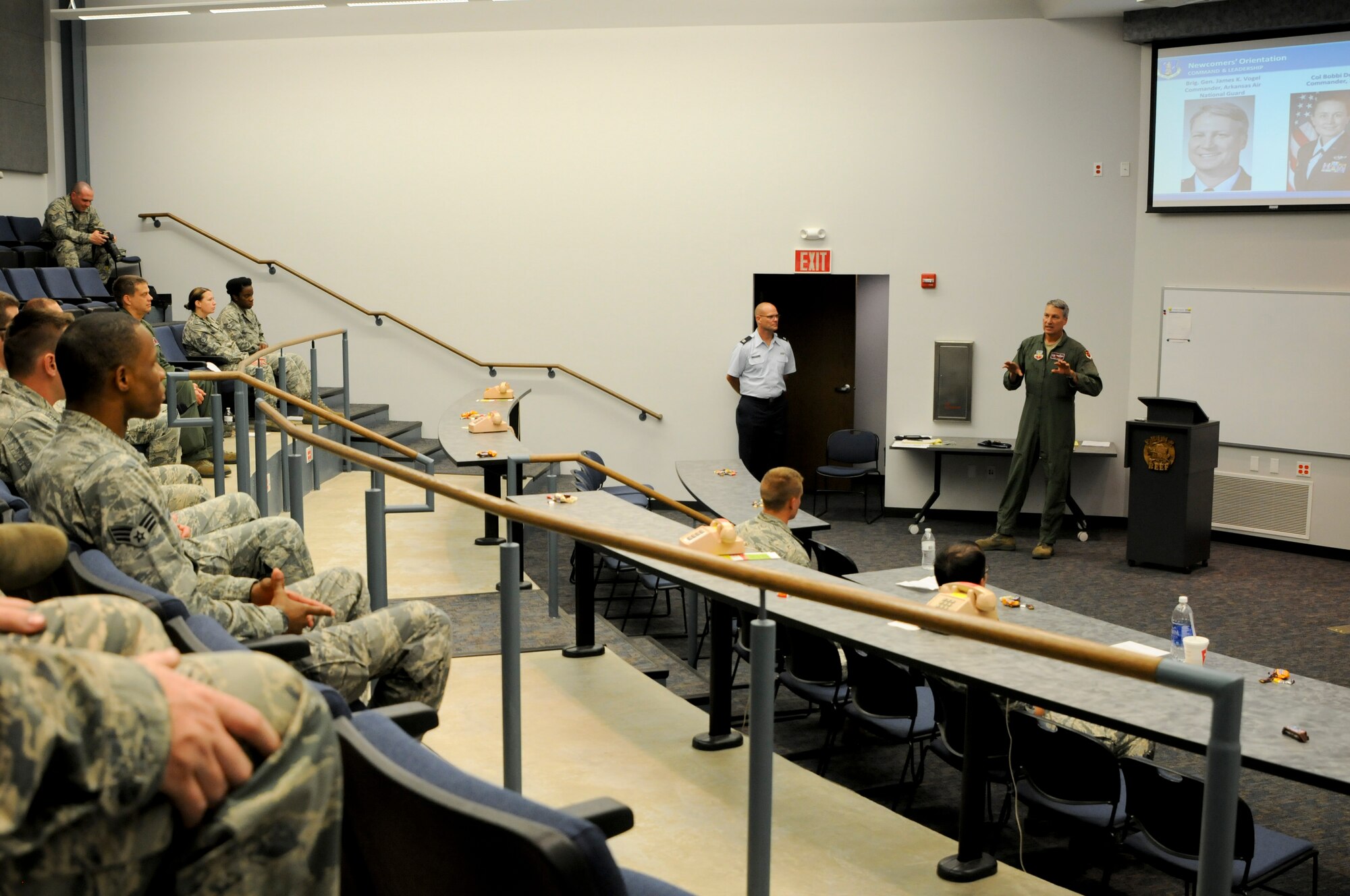 Brig. Gen. Kurt Vogel, commander of the Arkansas Air National Guard, speaks to Airmen during a newcomers orientation class held Aug. 1, 2015 at Ebbing Air National Guard Base, Ark. Vogel relayed the priorities of The Adjutant General, Maj. Gen. Mark Berry, and took time to interact with Airmen to learn about their jobs and impact on the new mission. (U.S. Air National Guard photo by Capt. Holli Nelson/Released)