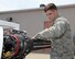 Senior Airman Daniel Fox, 9th Civil Engineer Squadron Explosive Ordinance Disposal Technician, disassembles M61 Vulcan 20 mm rotary cannon as part of training at Kingsley Field Air National Guard Base, Oregon, July 30, 2015. The training was conducted by the 173rd Fighter Wing for Fox and other members of the 9th CES EOD flight. (U.S. Air Force photo by Airman 1st Class Ramon A. Adelan)