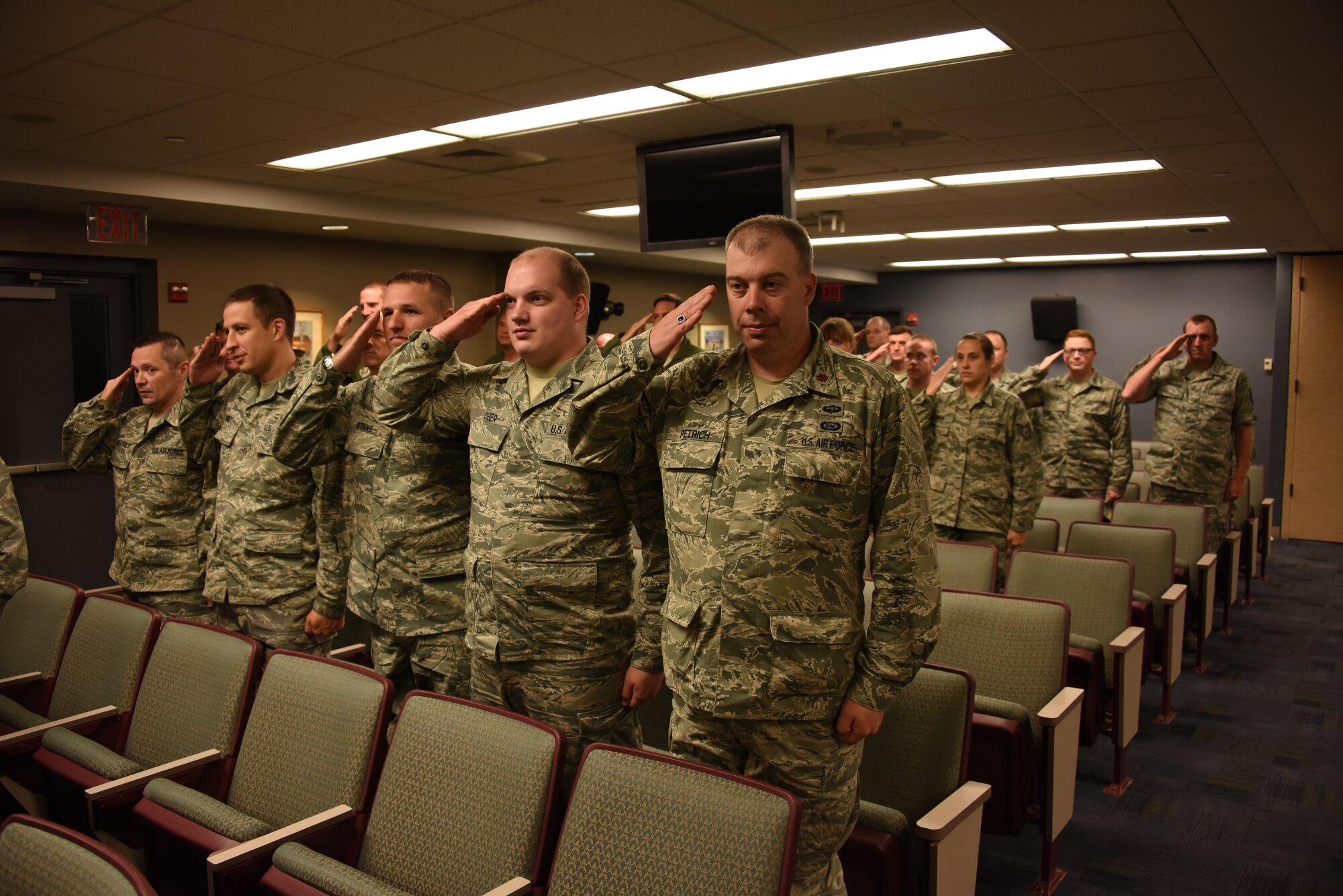 Members of the 911th Operations Support Squadron render their first salute to their new squadron commander in an assumption of command ceremony at the Pittsburgh International Airport Air Reserve Station, August 1, 2015. Lt. Col. Jennifer Fitch, 911th OSS commander, assumed command of the squadron during the August unit training assembly. (U.S. Air Force photo by Senior Airman Marjorie A. Bowlden)