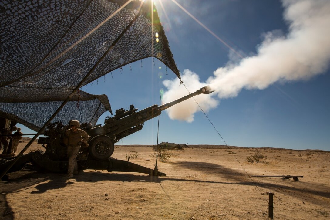 U.S. Marine Corps Lance Cpl. Kyle Jones with Battery C, 1st Battalion, 10th Marine Regiment, fires the M777 155mm howitzer as part of reinforcing ground combat element units in fire support coordination drills during an Integrated Training Exercise (ITX) aboard Marine Corps Air Ground Combat Center Twentynine Palms, Calif., July 27, 2015. ITX is conducted to enhance the integration and warfighting capability from all elements of the Marine Air Ground Task Force. (U.S. Marine Corps photo by Lance Cpl. Clarence A. Leake/Released)